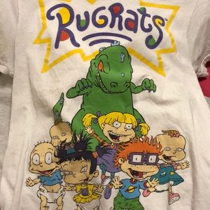 A rugrats short sleeve shirt with the dinosaur etc